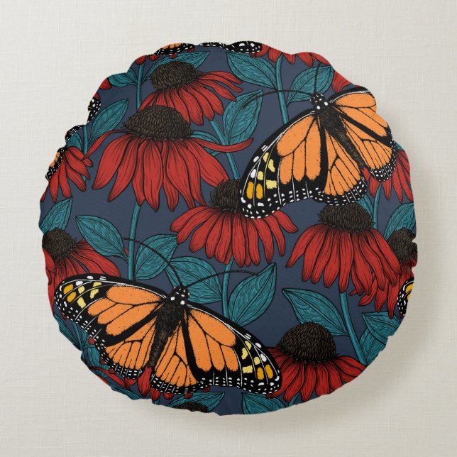 Monarch butterfly on red coneflowers round cushion (Front)