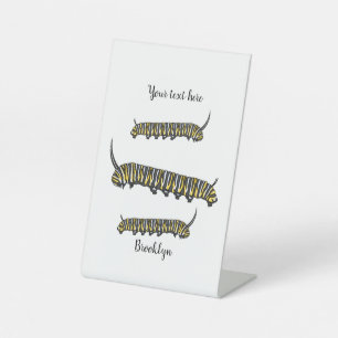 Monarch caterpillar cartoon illustration pedestal sign