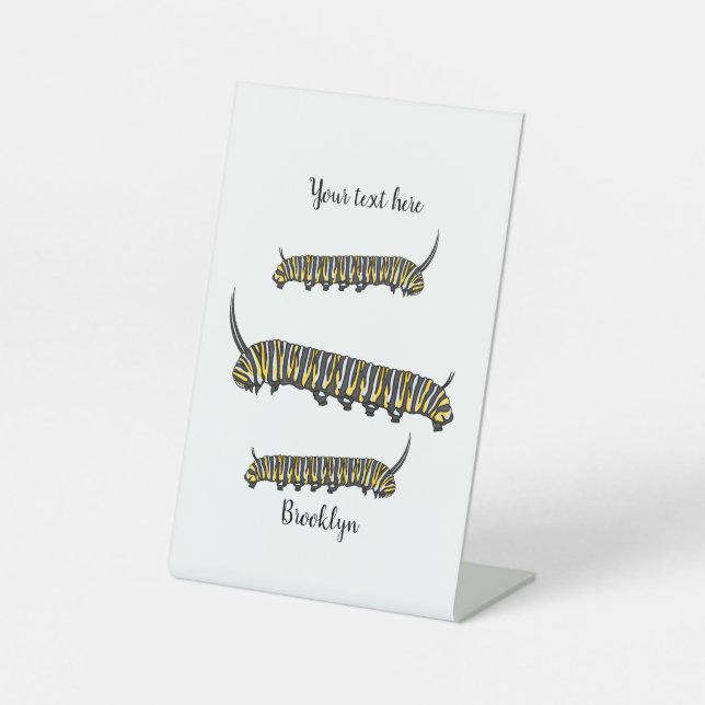 Monarch caterpillar cartoon illustration pedestal sign (Front)