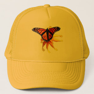 Monarch resting on a brown eyed susan trucker hat