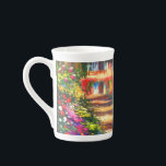 Monet Garden at Giverny Bone China Mug<br><div class="desc">Bone China Mug featuring Claude Monet’s oil painting Pathway in Monet's Garden at Giverny (1902). A beautiful path of pink,  white,  and red flowers. Peaceful nature impressionism with lovely flowers and scenic landscape. A great Monet gift for fans of impressionism and French art.</div>