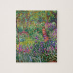 Monet “The Iris Garden at Giverny” Jigsaw Puzzle<br><div class="desc">Monet was a founder of French Impressionist painting, of which “The Iris Garden at Giverny” (painted between 1899 and 1900) is a beautiful example. It’s a celebration of color, light and movement. When Monet purchased the Giverny estate, he redesigned the flower garden already planted on its grounds. His preference for...</div>