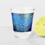 Monet Water Lilies 1906 Shot Glass<br><div class="desc">Shot Glass featuring Claude Monet’s oil painting Water Lilies (1906). A serene still life of the interplay between light and reflection upon beautiful water lilies in a pond. A great gift for fans of impressionism and French art.</div>