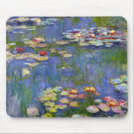 Monet Water Lilies 1916 Mouse Pad<br><div class="desc">Monet Water Lilies 1916 mouse pad. Oil painting on canvas from 1916. French impressionist Claude Monet remains renowned and beloved for the water lily paintings that he created at his garden pond at Giverny. This specific water lily painting is from 1916 and reveals Monet’s move towards increasing abstraction and more...</div>