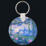 Monet Water Lilies Key Chain<br><div class="desc">Monet Water Lilies key chain. Oil painting on canvas from 1916. Monet painted his famous water lily pond obsessively during the final years of his career, drawing inspiration from the light of the sun and its shifting effect on the water and the aquatic flowers and foliage. This painting features a...</div>