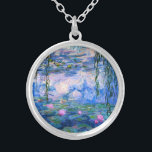 Monet Water Lilies Necklace<br><div class="desc">Monet Water Lilies necklace. Oil painting on canvas from 1916. Monet painted his famous water lily pond obsessively during the final years of his career, drawing inspiration from the light of the sun and its shifting effect on the water and the aquatic flowers and foliage. This painting features a vibrant...</div>
