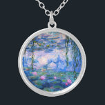 Monet Water Lilies Necklace<br><div class="desc">Monet Water Lilies necklace. Oil painting on canvas from 1916. Monet painted his famous water lily pond obsessively during the final years of his career, drawing inspiration from the light of the sun and its shifting effect on the water and the aquatic flowers and foliage. This painting features a vibrant...</div>