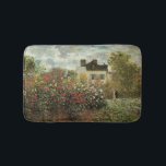 Monet's Garden at Argenteuil by Claude Monet Bath Mat<br><div class="desc">The Artist's Garden in Argenteuil (A Corner of the Garden with Dahlias) (1873) by Claude Monet is a vintage impressionism fine art floral nature painting. A country farm house is in the background. A couple in love is walking past a romantic spring season garden with blooming roses and other flowers....</div>