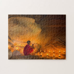 Monk Praying By A Buddha Jigsaw Puzzle