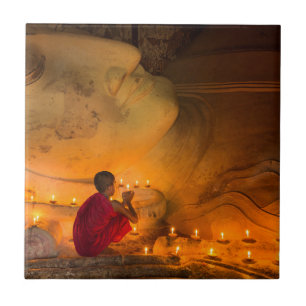 Monk Praying By A Buddha Tile