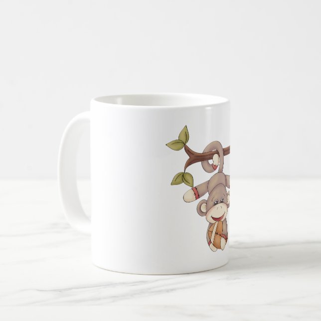 Monkey Holding A Football Coffee Mug (Front Left)