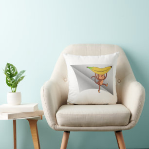 monkey with banana under the patch cushion