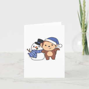 Monkey With Snowman In Winter For Christmas Holiday Card