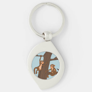 Monkeys climbing the tree cartoon keychain