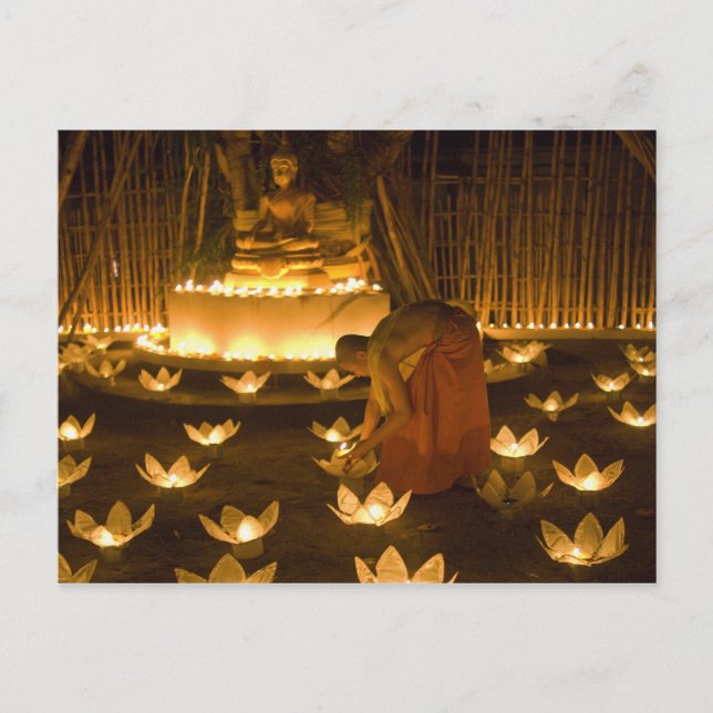 Monks lighting khom loy candles and lanterns for postcard (Front)