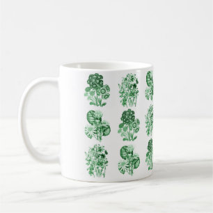 Monochrome flowers in green coffee mug