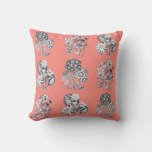 Monochrome flowers on coral background cushion