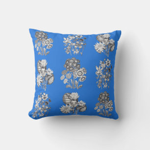 Monochrome flowers on electric blue background cushion