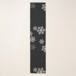 Monochrome Minimalist Snowflake Christmas Pattern Scarf<br><div class="desc">This black and white, simple snowflake pattern encapsulates the serene beauty of winter with a modern, minimalist flair. Crafted in a sophisticated black and white colour scheme, this design is the epitome of understated elegance, perfect for those who appreciate a masculine touch in their holiday decor. Each snowflake creates a...</div>