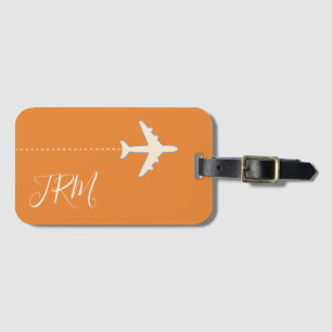 monogram & aeroplane on orange travel luggage tag