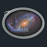 Monogram Barred Spiral Galaxy NGC 1672 Oval Belt Buckle<br><div class="desc">Galaxies, Stars and Nebulae series This NASA Hubble Space Telescope view of the nearby barred spiral galaxy NGC 1672 unveils details in the galaxy's star-forming clouds and dark bands of interstellar dust. One of the most striking features is the dust lanes that extend away from the nucleus and follow the...</div>