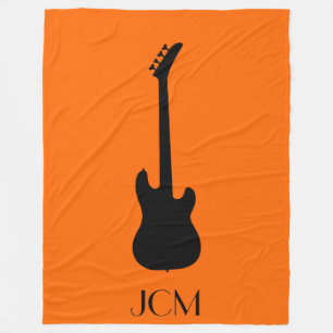 Monogram Black Electric Bass Guitar on Orange Fleece Blanket
