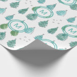 Monogram Christmas Trees Wrapping Paper<br><div class="desc">Decorate your Christmas gifts with this modern Christmas tree patterned wrapping paper.
It is decorated with a simple watercolor in shades of green and turquoise.
Customise it with your initial or that of your family.
Original Watercolor © Michele Davies.</div>