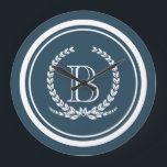 Monogram design large clock<br><div class="desc">Monogram design with laurel wreath decoration in striped round shape on blue background</div>