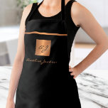 Monogram elegant black gold name script  apron<br><div class="desc">Luxury exclusive looking monogrammed stylish apron featuring a faux gold copper metallic glitter square and lines over a stylish classy solid black background.           Personalise it with your name or family name and monogram name initial.</div>