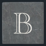 Monogram Elegant Black Stone Texture Stone Coaster<br><div class="desc">An elegant looking black marbled stone texture. Cuts,  scrapes,  scarring and random marks give it depth and personality. Personalise with your initial / monogram in a bold white font.</div>