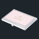 Monogram Elegant Minimal Blush Pink and Gold Business Card Holder<br><div class="desc">A simple stylish custom monogram design in a gold modern minimalist typography on an elegant pastel blush pink background. The monogram initials and name can easily be personalised along with the feature line to make a design as unique as you are! The perfect bespoke gift or accessory for any occasion....</div>