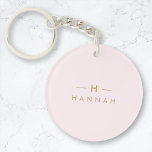 Monogram Elegant Minimal Blush Pink and Gold Key Ring<br><div class="desc">A simple stylish custom monogram design in a gold modern minimalist typography on an elegant pastel blush pink background. The monogram initials and name can easily be personalised along with the feature line to make a design as unique as you are! The perfect bespoke gift or accessory for any occasion....</div>