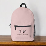 Monogram Elegant Minimal Blush Pink Printed Backpack<br><div class="desc">Upgrade your everyday style with the Monogram Elegant Minimal Blush Pink Printed Backpack. This sophisticated backpack features a chic sage green design with an elegant monogram, customisable with your initials. Crafted from durable materials, it offers spacious compartments, a padded laptop sleeve, sturdy zippers, and convenient side pockets. The comfortable padded...</div>