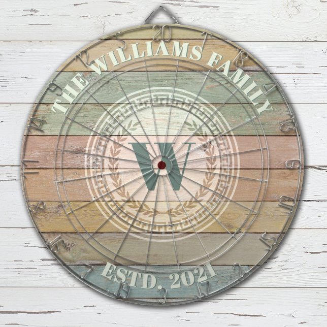 Monogram Family Name Vintage Crest Dartboard (Monogram Family name and monogram dartboard with w rustic colored word background for a beachy style)