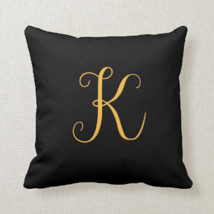 Monogram gold-coloured "K" on black Cushion
