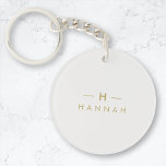 Monogram Gold Gray | Minimalist Elegant Modern Key Ring<br><div class="desc">A simple stylish custom monogram design in a gold modern minimalist typography on an elegant minimalist soft taupe gray background. The monogram initials and name can easily be personalized along with the feature line to make a design as unique as you are! The perfect bespoke gift or accessory for any...</div>