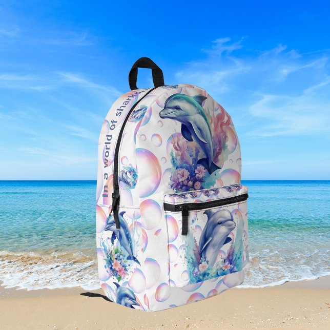 Monogram In a World of Sharks, Be a Dolphin White Printed Backpack (Creator Uploaded)