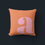 Monogram Initial Letter Bold Pink Orange Playful Cushion<br><div class="desc">A bold and stylish throw pillow featuring a warm orange background with a large pink lowercase letter in modern typography. This eye-catching design adds a playful yet sophisticated touch to any space, making it perfect for contemporary, mid-century, or eclectic home decor. A great statement piece for living rooms, bedrooms, or...</div>