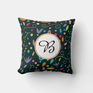monogram & leaves patterned cushion
