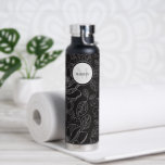 Monogram magnolia illustration Personalised Water Bottle<br><div class="desc">Introducing our "Personalised Monogram Magnolia Illustration Black and White Water Bottle" – a stylish and customisable accessory for staying hydrated on the go. This water bottle features a chic magnolia illustration in black and white, personalised with your monogram for a unique touch. Stay hydrated in style with this personalised water...</div>