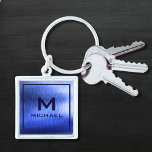 Monogram Metallic Blue Textured Personalised Name Key Ring<br><div class="desc">Monogram Metallic Blue Textured Personalised Name keychain features a textured abstract metallic blue design with your monogram and personalised name. Personalise by editing the text in the text boxes provided. Designed by ©Evco Studio www.zazzle.com/store/evcostudio</div>