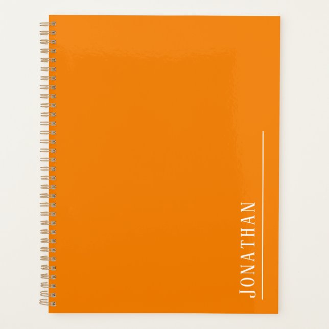Monogram minimalist orange planner (Front)