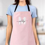 Monogram Name Elegant Minimal Blush Pink Apron<br><div class="desc">Personalised Custom Blush Pink Initial Name Monogram Apron. This girly and feminine apron is perfect for adding a stylish and personal touch to your work attire. Whether you're a florist arranging blooms, a hair stylist in the salon, or a chef whipping up creations in the kitchen, this apron combines elegance...</div>