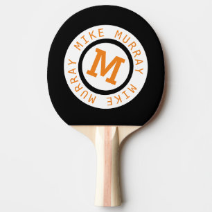monogram on black ping pong paddle