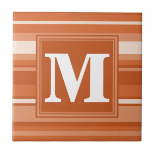 Monogram orange stripes tile