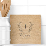 Monogram personalised rustic kitchen family name tile<br><div class="desc">Custom laurel monogrammed family name and established year elegant chic rustic country farmhouse style ochre beige burlap template tile.         A modern keepsake gift or kitchen decor for weddings,  anniversaries,  housewarmings,  Thanksgiving,  Christmas,  or any other occasion.</div>