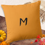 Monogram Pumpkin Orange Thanksgiving Fall Autumn Cushion<br><div class="desc">Bring a cosy accent to your decor this Fall season, with this simple and rustic throw pillow. In warm pumpkin orange, the pillow can be personalised with an initial as a stylish brush script monogram. The pillow makes a stylish and comfortable accessory, for relaxing with your favourite hot drink on...</div>