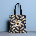 Monogram Tropical Pineapple Girly Gold Navy Tote Bag<br><div class="desc">This modern tropical design features gold pineapples on a navy blue background with your personalised monogram in the centre. Personalise by editing the text in the text box provided. #monogram #monogrammed #initial #personalised #tropical #pineapple #girly #feminine #fruit #gold #navy #navyblue #golden #chic stylish #elegant #feminine #giftsforher #blue #accessories #tote #bags...</div>