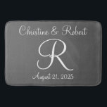 Monogrammed bathmat<br><div class="desc">A perfect reminder of a special day,  monogrammed bathmat.  Wedding or anniversary. Available in different sizes.  The background colour may be changed also to fit your decor.</div>