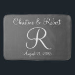 Monogrammed bathmat<br><div class="desc">A perfect reminder of a special day,  monogrammed bathmat.  Wedding or anniversary. Available in different sizes.  The background colour may be changed also to fit your decor.</div>